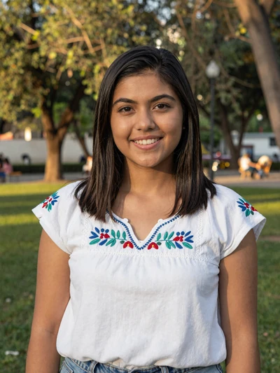Ximena, 29-year-old Mexican woman in embroidered top at a Monterrey park