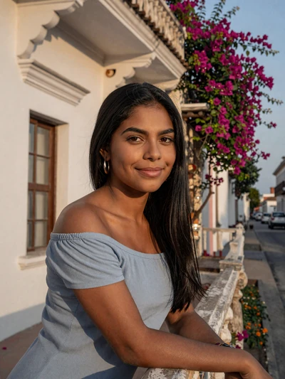 Lucía, 26, Colombian woman on a colonial balcony in Cartagena